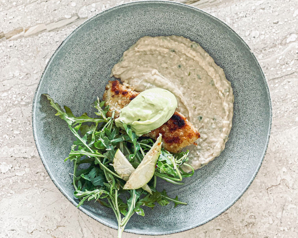CUMIN CRUMBED BASA ON BEAN SKORDALIA WITH AVO HOLLANDAISE – ORNAMENT