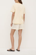 Assembly Label | Organic Base Tee | Butter